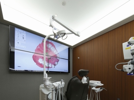 Digital displays for patients to view dental treatment outcomes and options.
